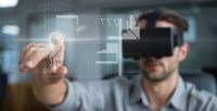 Man in VR headset touching interface with flare 1039287